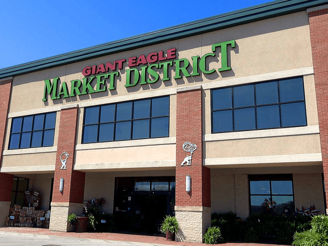 Market District sign on a storefront.