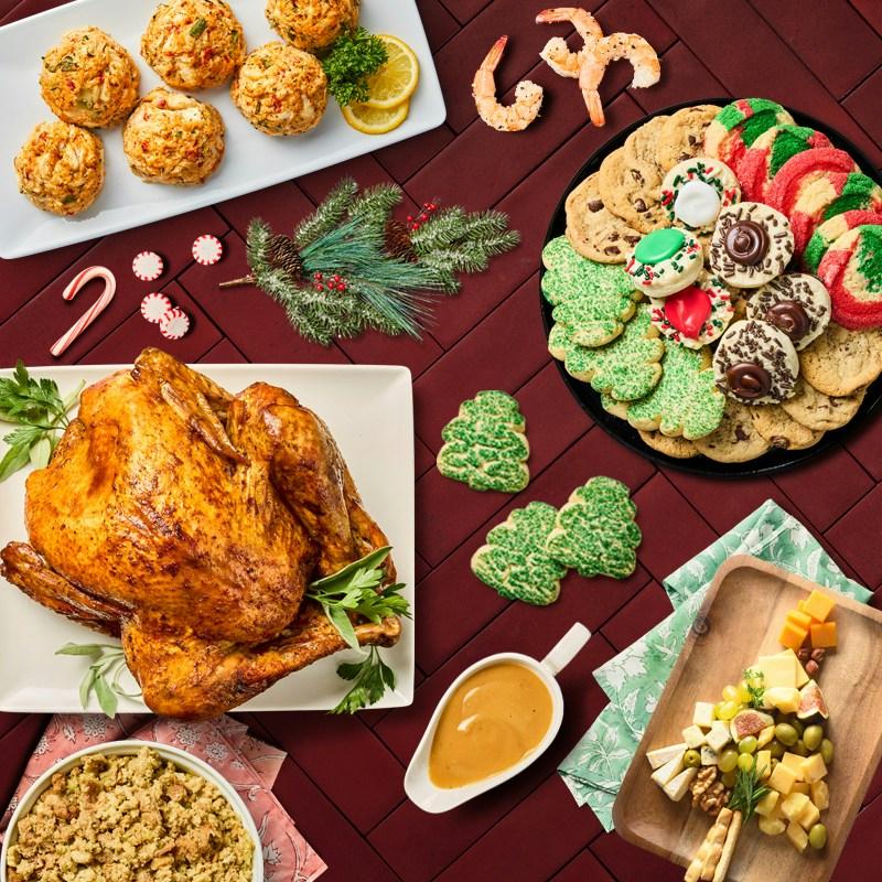 Turkey, holiday cookies, charcuterie, gravy pitcher, stuffing, shrimp, and other festive foods